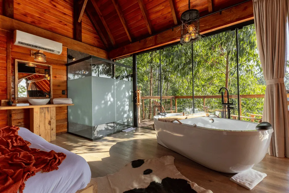 Cabana Álamo living area and table overlooking the fields